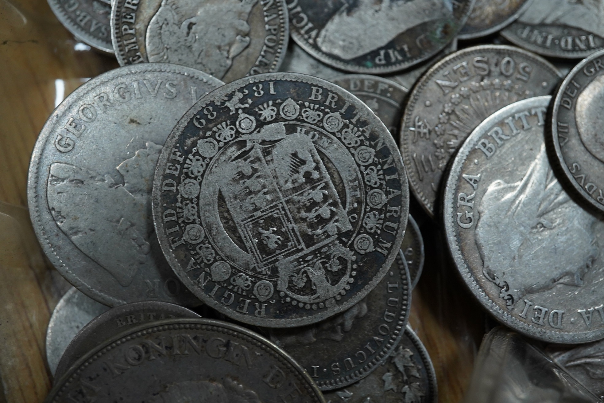 A quantity of British, Dutch, South Africa etc silver coins, 19th- early 20th century, to include a George V crown 1930, about EF etc.